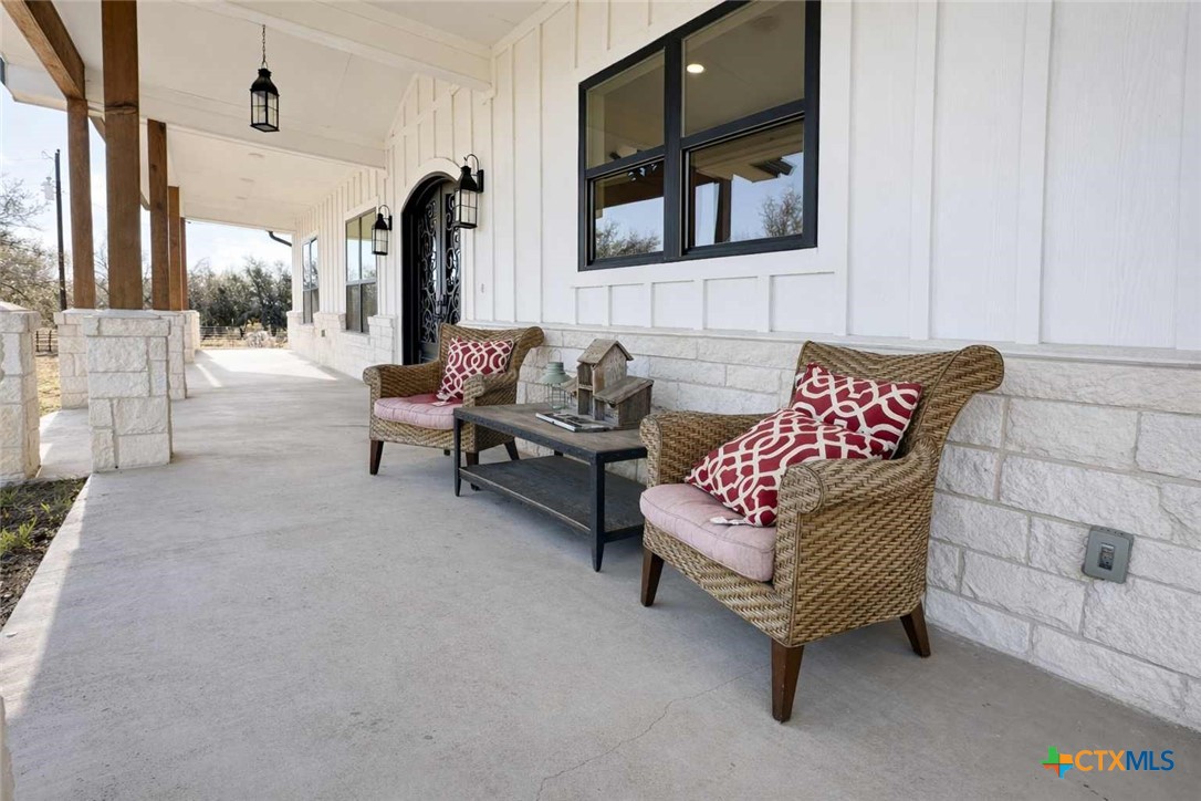 705 Indian Hills Road Gatesville, TX 76528 - Photo 29 of 43 a living room with furniture and a fireplace