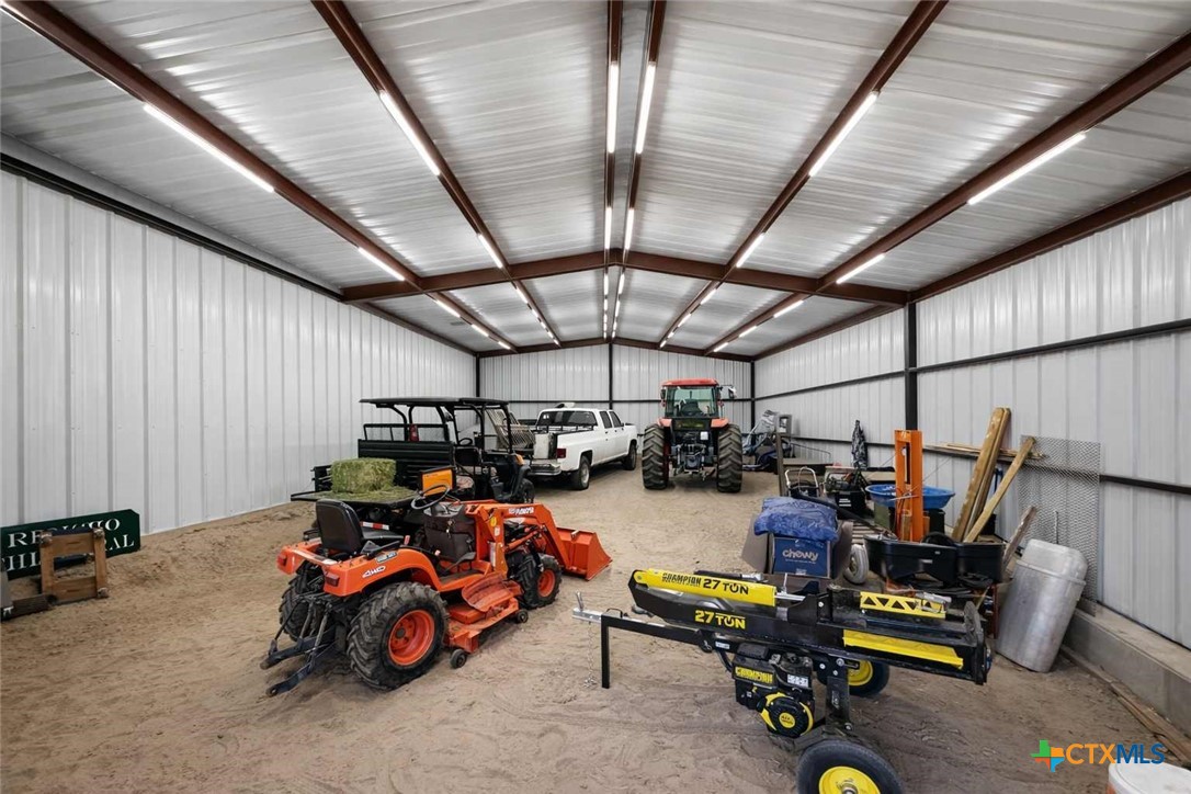705 Indian Hills Road Gatesville, TX 76528 - Photo 34 of 43 a view of a garage with a table and chairs