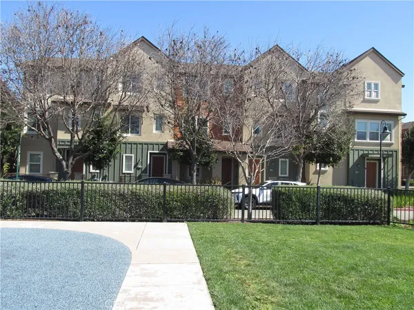 a view of a house with a garden