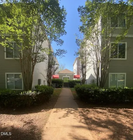 a view of a garden with a patio