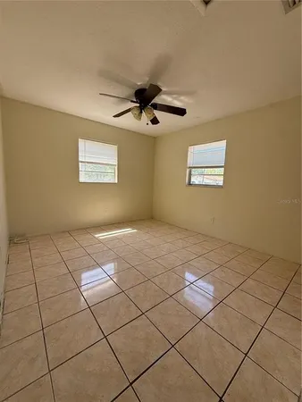a view of an empty room and window