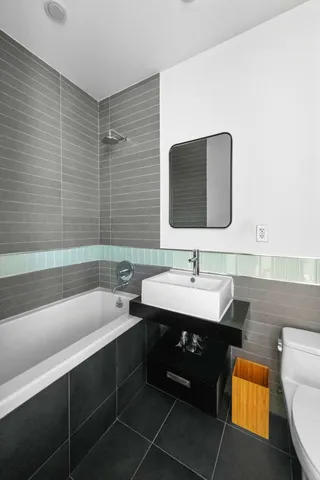 a bathroom with a sink and a bathtub