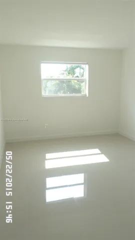 a view of empty room with window