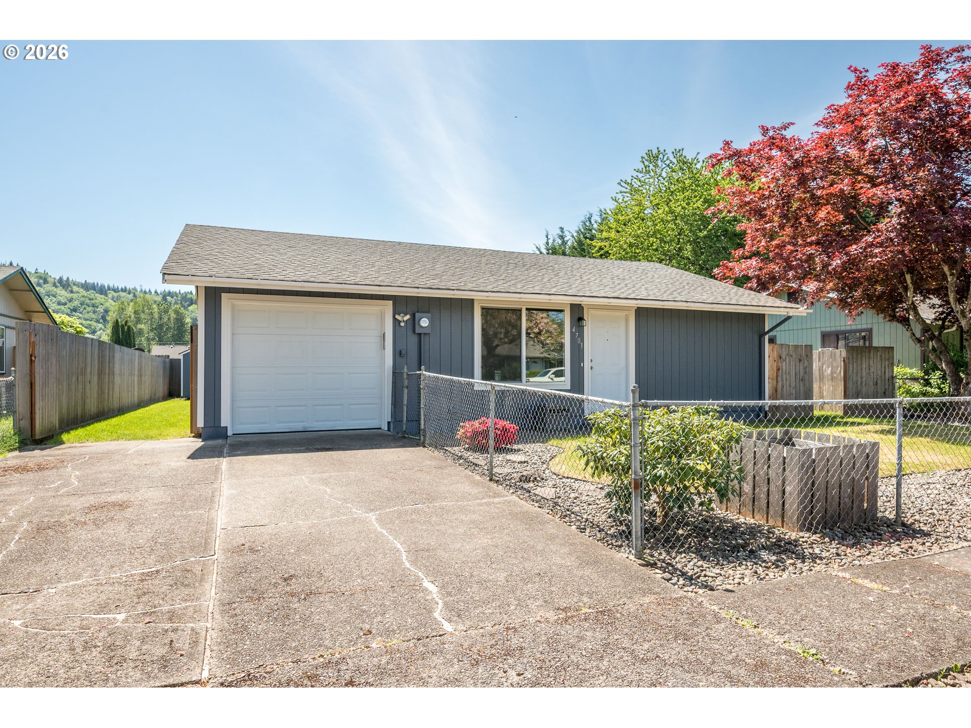 4703 Merlin Street Longview, WA 98632 - Photo 2 of 25 a view of a house with a patio