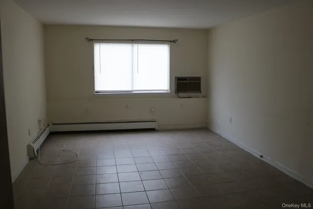 an empty room with a window