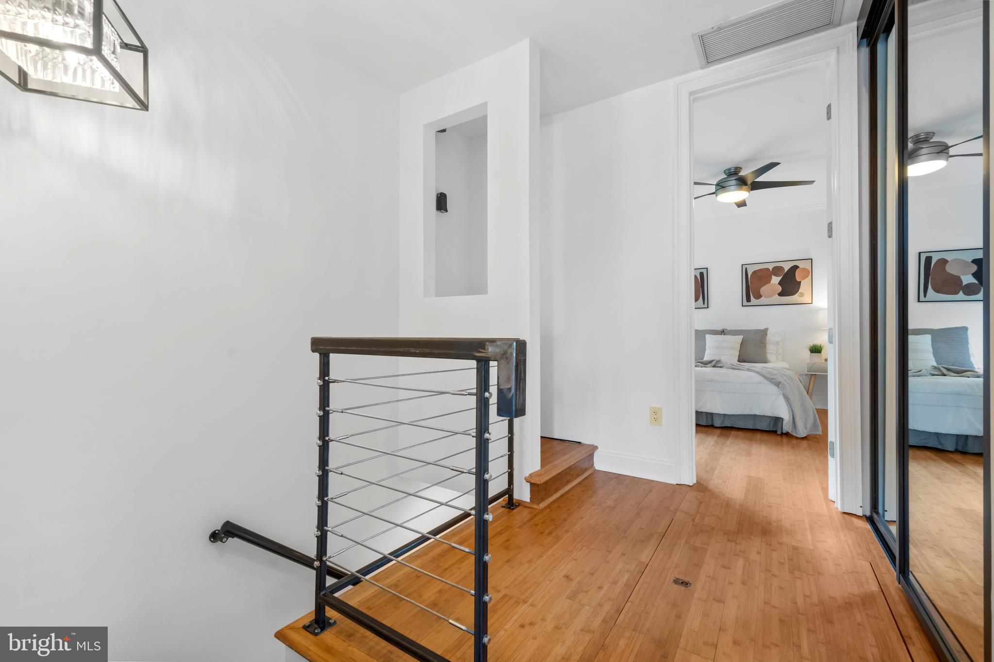 1625 Q Street Northwest, Unit 203 Washington, DC 20009 - Photo 14 of 33 a bedroom with a bed and a view of living room