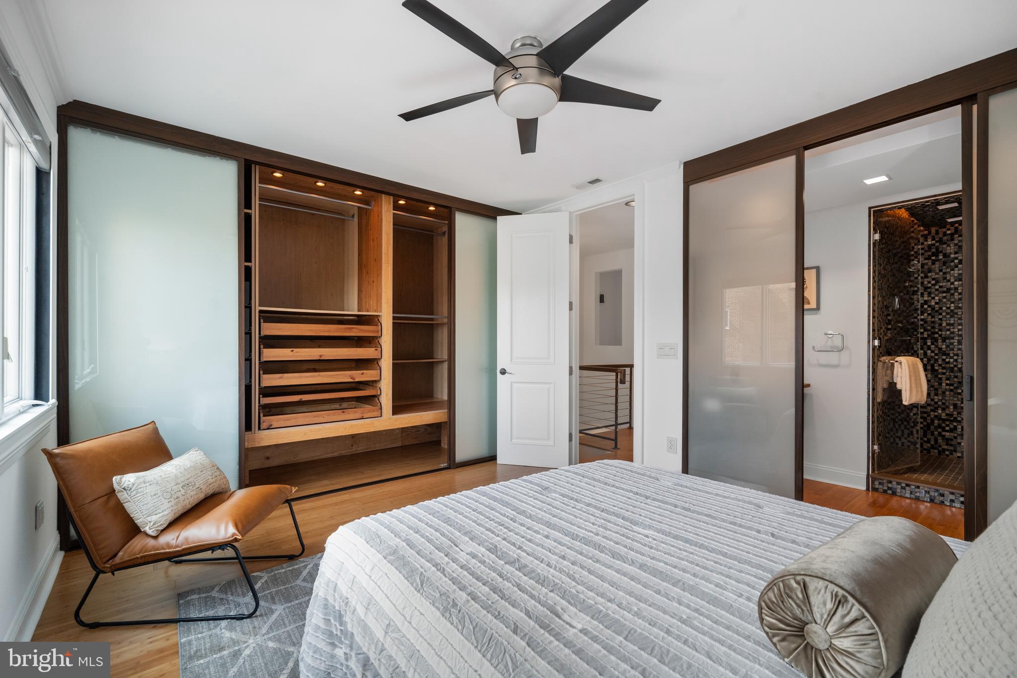 1625 Q Street Northwest, Unit 203 Washington, DC 20009 - Photo 16 of 33 a bedroom with a bed and a window