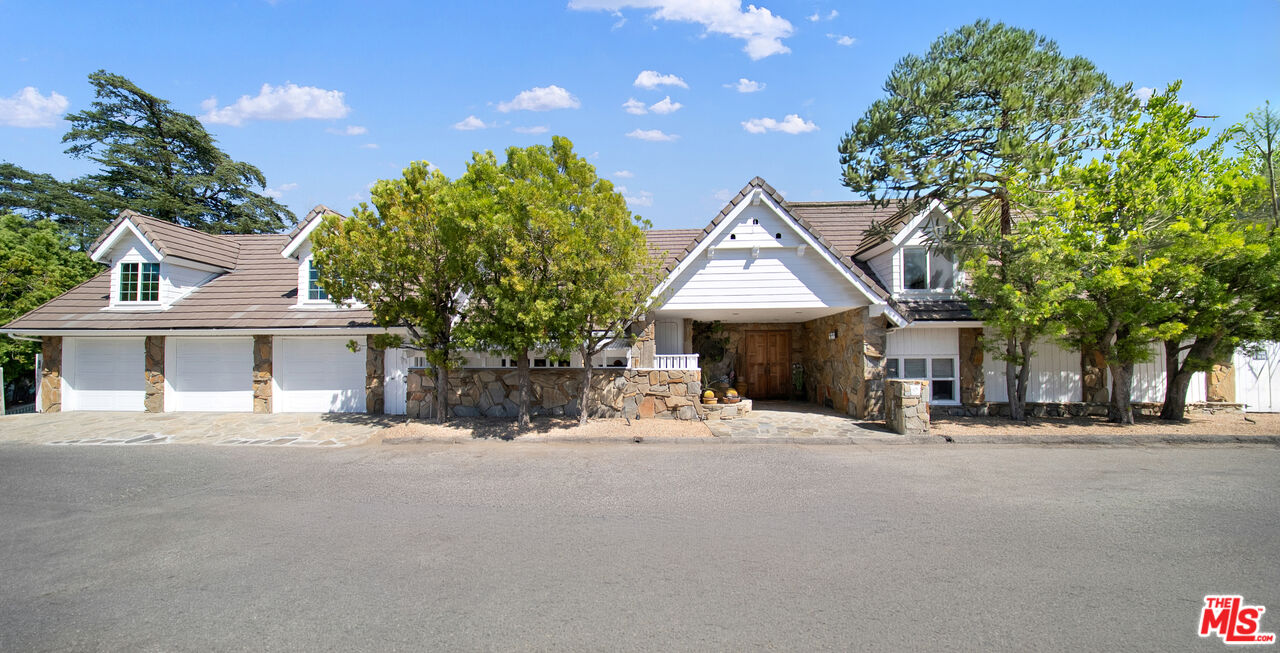 2312 Kimridge Road Beverly Hills, CA 90210 - Photo 51 of 60 a view of a house with a outdoor space