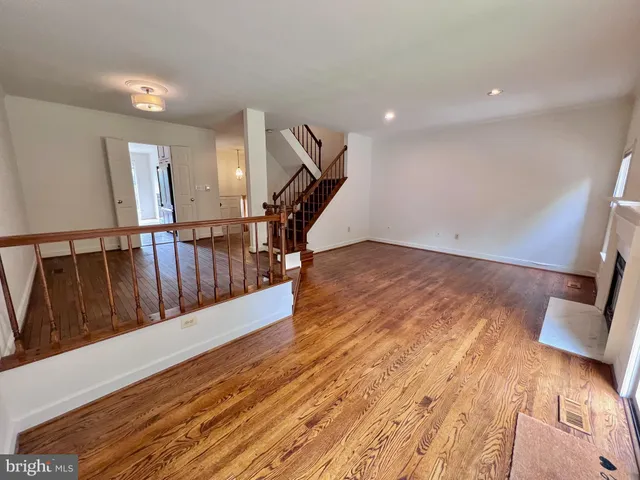 a view of entryway with wooden floor