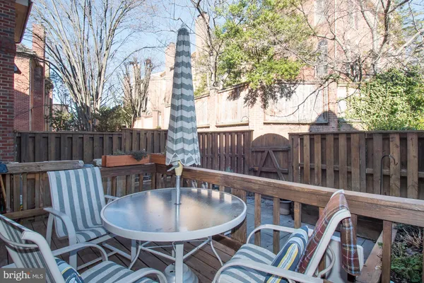 a view of a patio in backyard
