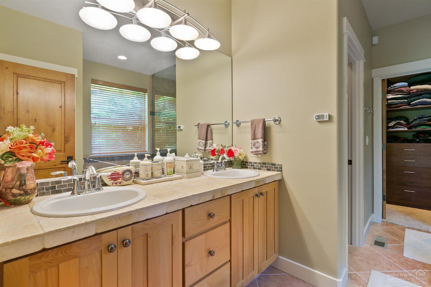 61950 Fall Creek Loop Bend, OR 97702 - Photo 10 of 25 Downstairs master bath with double vanit