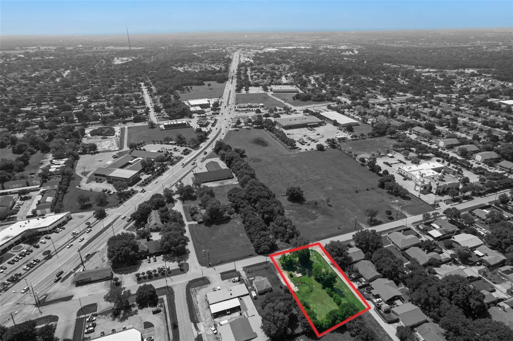 Aerial overview of property's location with property parcel outlined
