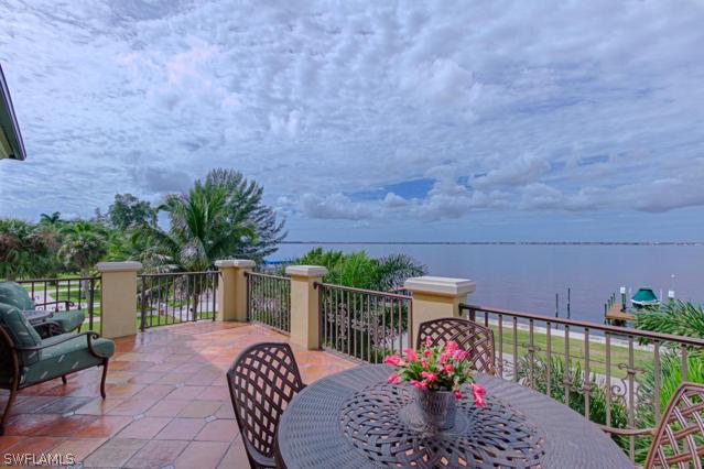 6005 West Riverside Drive Fort Myers, FL 33919 - Photo 11 of 24 a balcony with furniture and flowers
