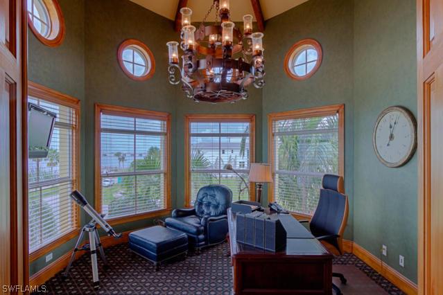 6005 West Riverside Drive Fort Myers, FL 33919 - Photo 14 of 24 a living room with furniture a rug and a window