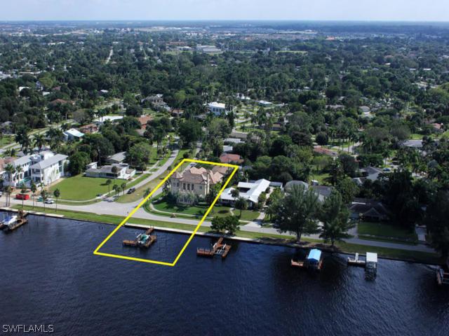 6005 West Riverside Drive Fort Myers, FL 33919 - Photo 2 of 24 an ocean view with a play ground