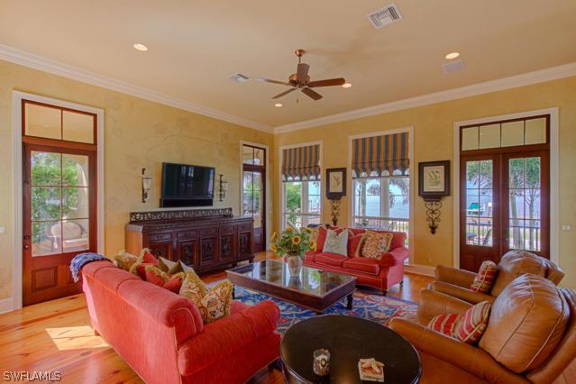 6005 West Riverside Drive Fort Myers, FL 33919 - Photo 5 of 24 a living room with furniture and a flat screen tv