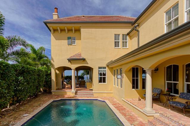 6005 West Riverside Drive Fort Myers, FL 33919 - Photo 10 of 24 a front view of a house with garden