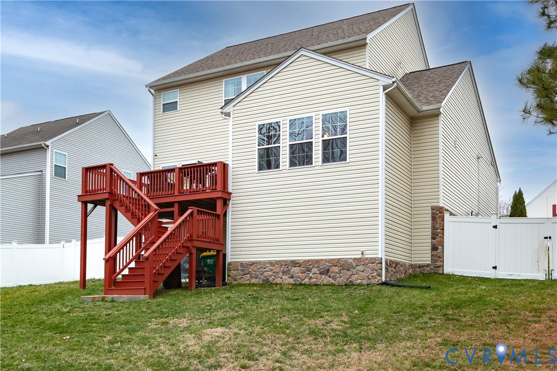 1916 River Ridge Place Hopewell, VA 23860 - Photo 20 of 23 The rear of the home showcases the deck and fenced