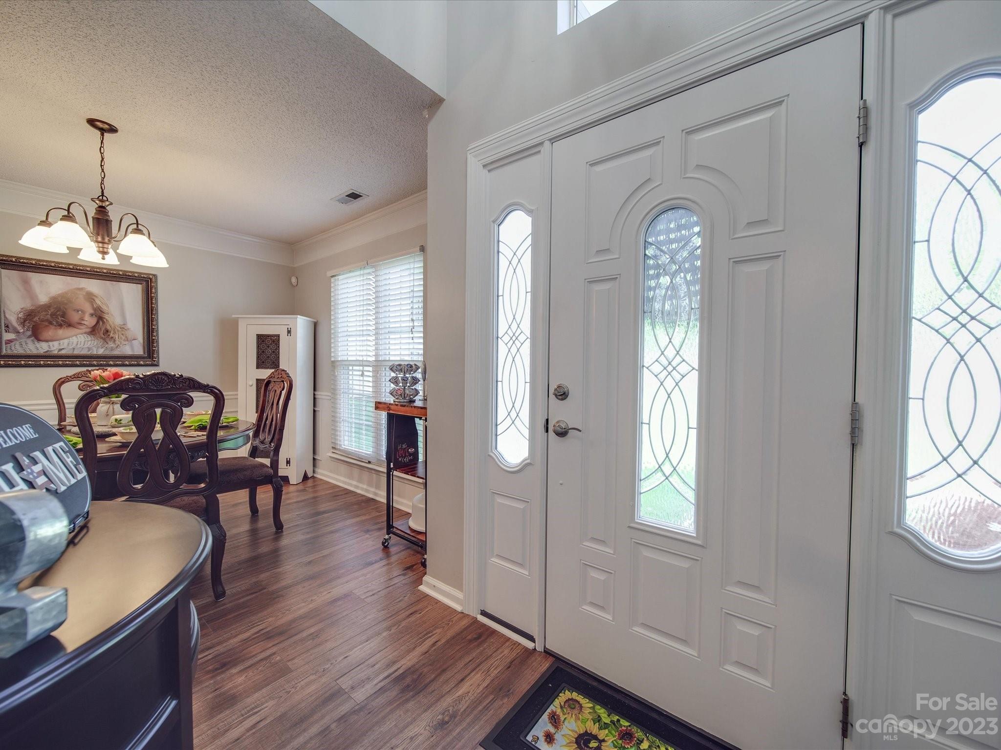 2349 Beaver Pond Road Kannapolis, NC 28083 - Photo 2 of 41 a view of a livingroom with furniture window and wooden floor