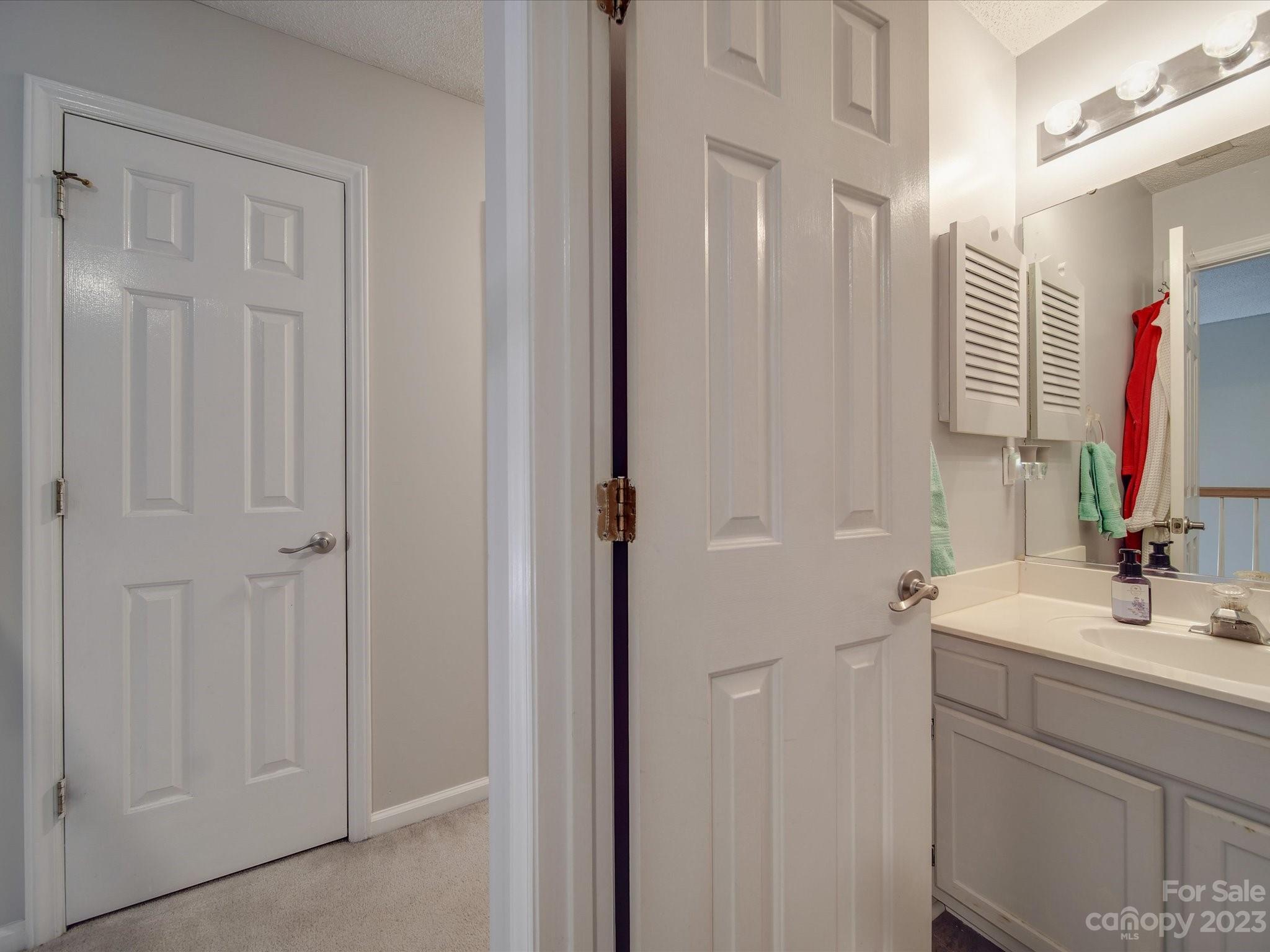 2349 Beaver Pond Road Kannapolis, NC 28083 - Photo 27 of 41 a bathroom with a sink and a mirror