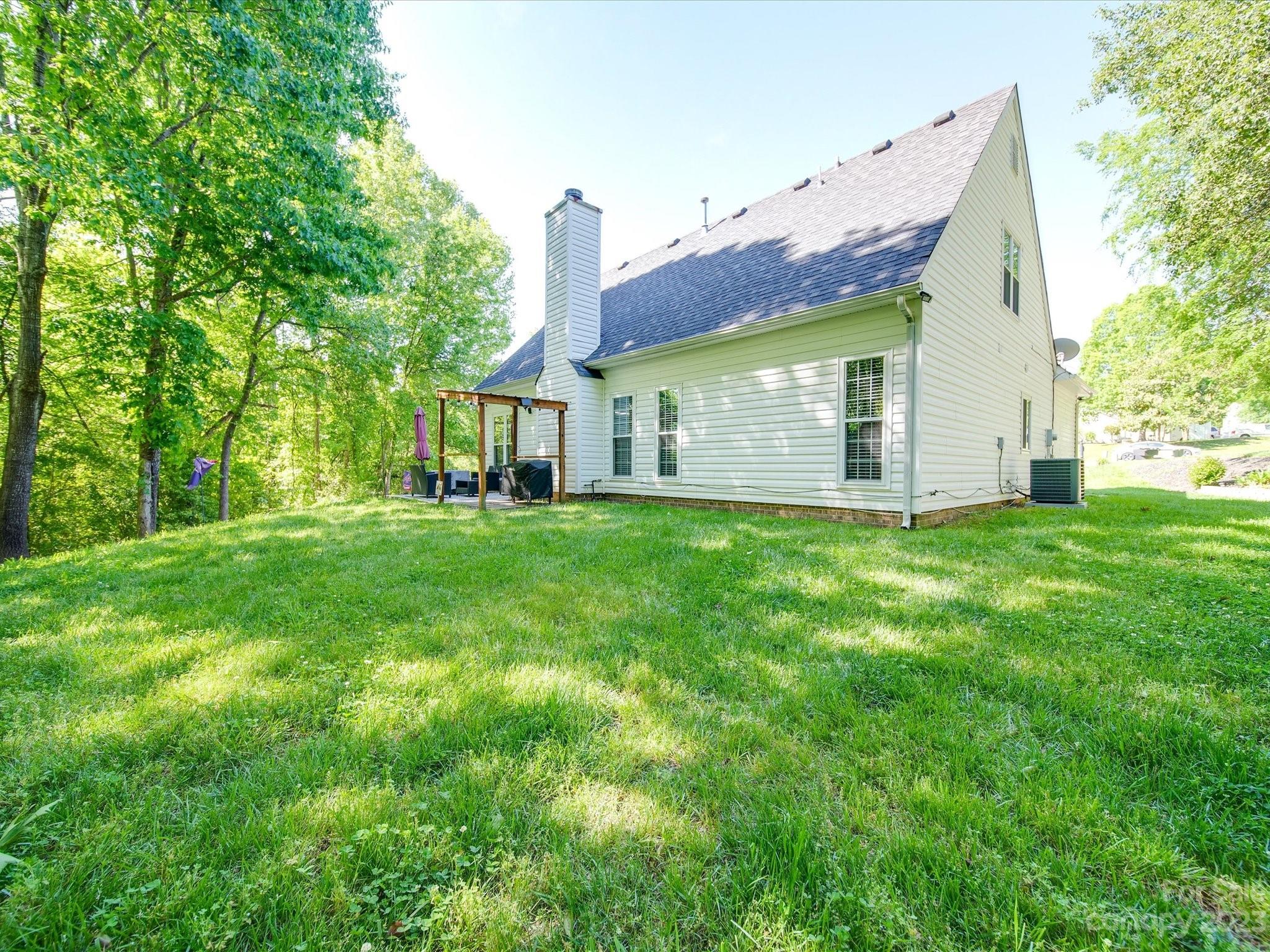 2349 Beaver Pond Road Kannapolis, NC 28083 - Photo 36 of 41 a view of a house with a yard and sitting area