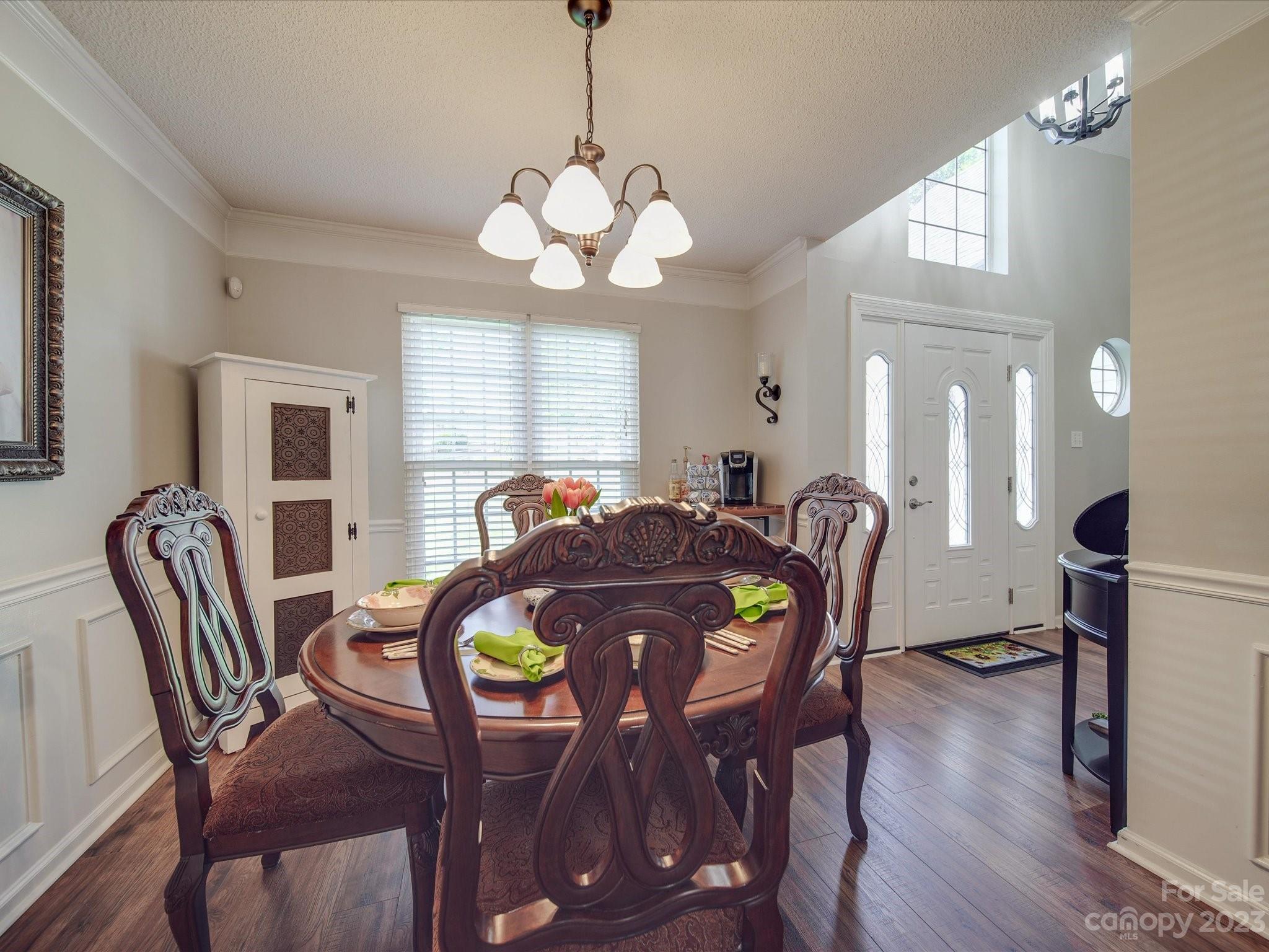 2349 Beaver Pond Road Kannapolis, NC 28083 - Photo 4 of 41 a view of a dining room with furniture and wooden floor