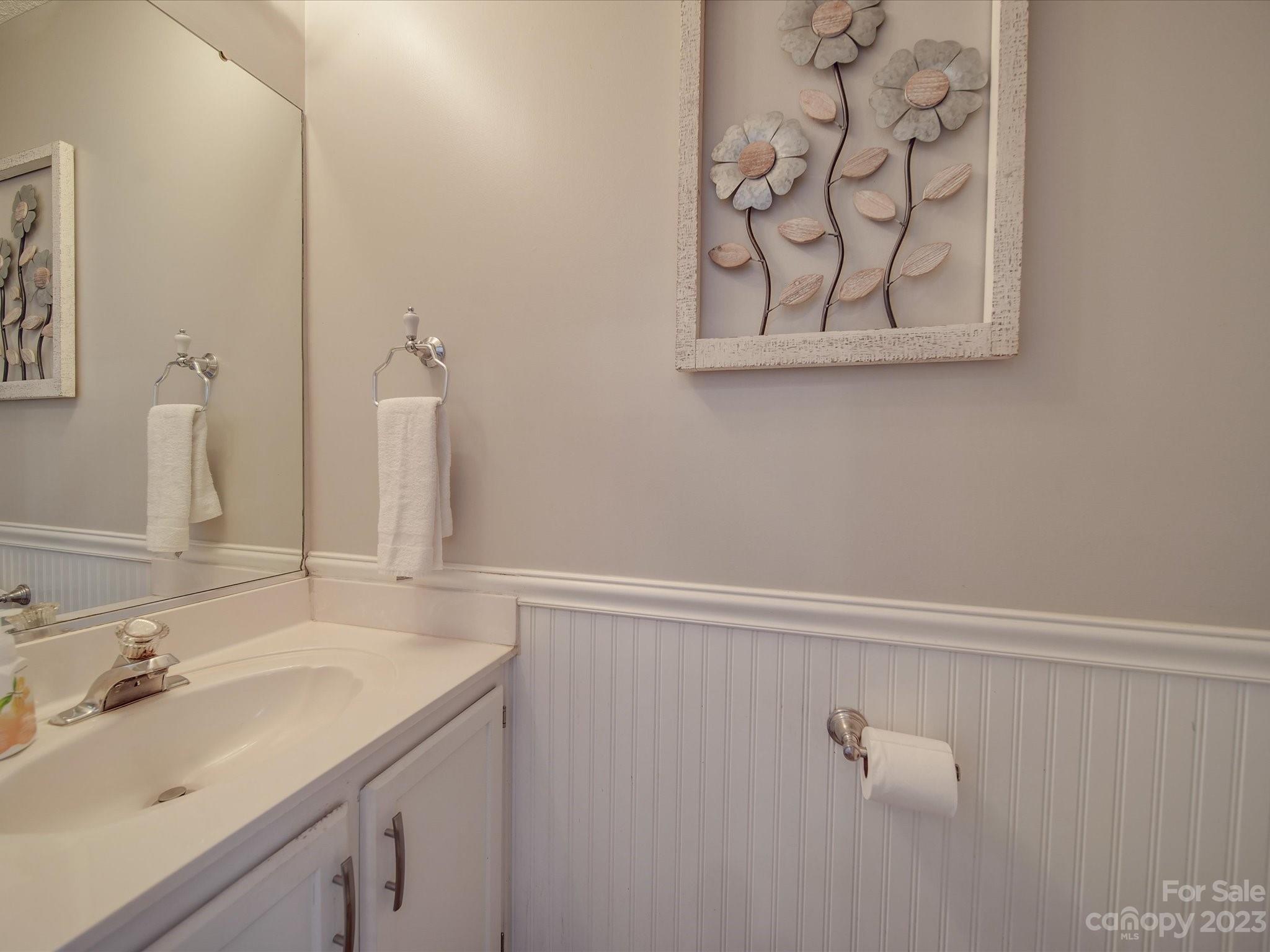 2349 Beaver Pond Road Kannapolis, NC 28083 - Photo 8 of 41 a bathroom with a sink and a mirror