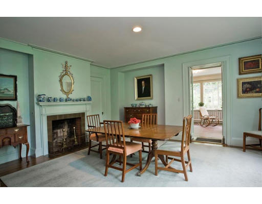 34 Spooner Road Brookline, MA 02467 - Photo 3 of 9 a dining room with furniture and fireplace