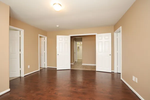 a view of a livingroom with wooden floor