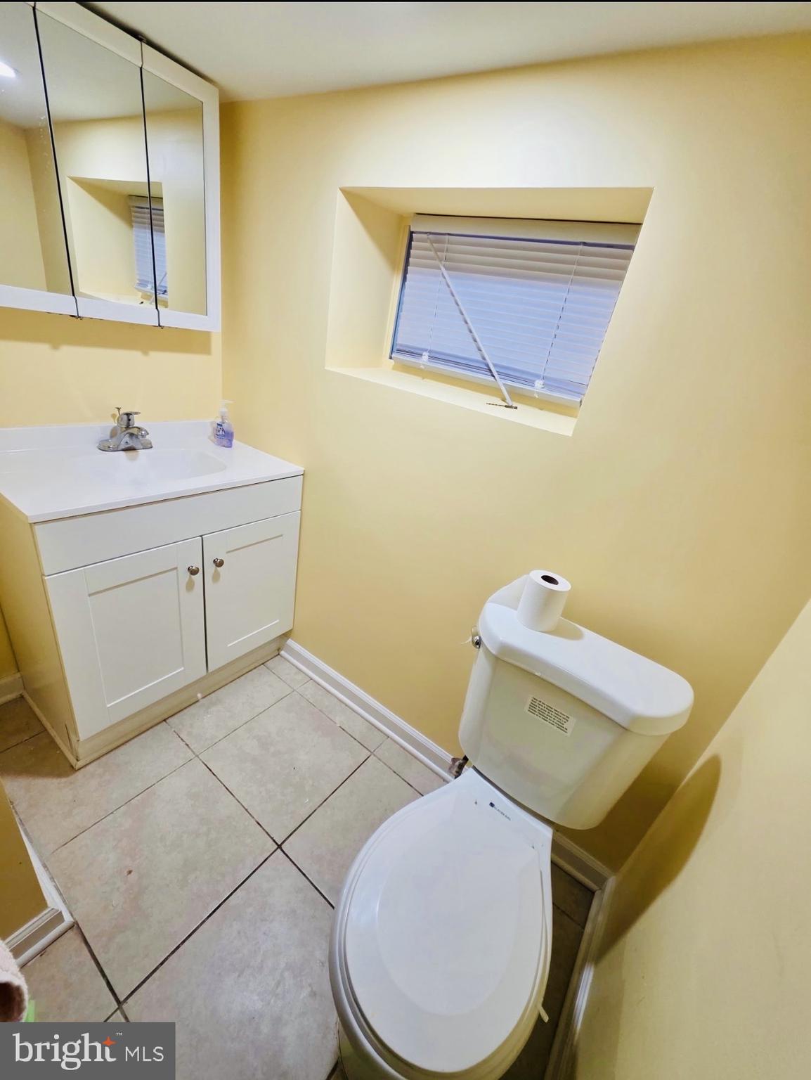 1968 William Street Union, NJ 07083 - Photo 43 of 43 a bathroom with a toilet and sink