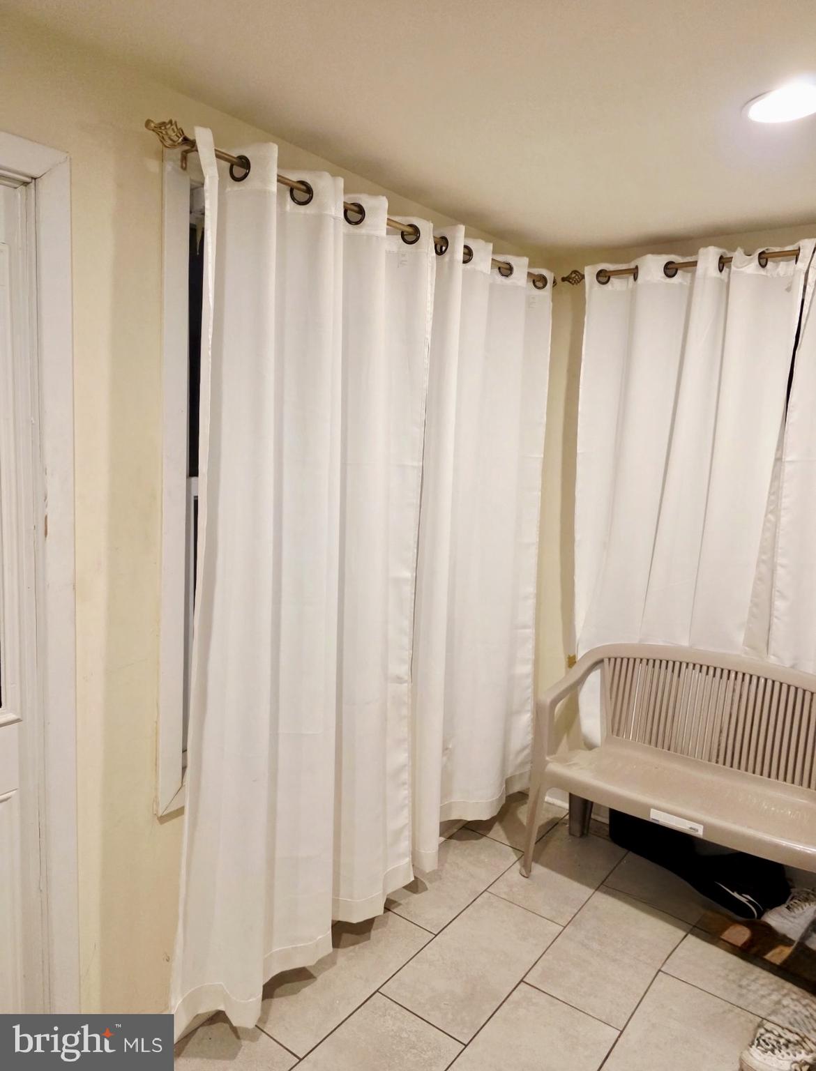 1968 William Street Union, NJ 07083 - Photo 6 of 43 a view of a room with a window and a shower curtain