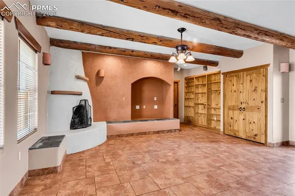 a white stove top oven sitting inside of a kitchen