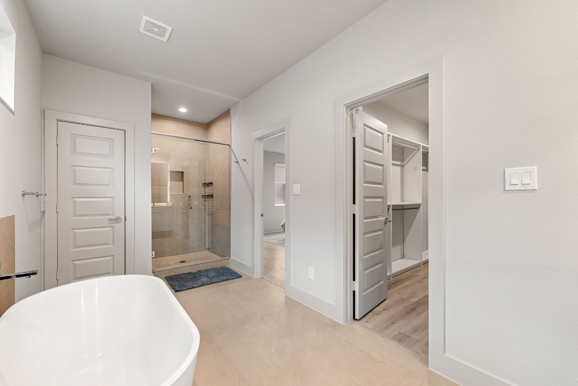 5722 Rucio Lane, Unit A Houston, TX 77092 - Photo 16 of 29 a view of a bathroom with shower