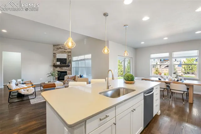 a large kitchen with kitchen island a lot of counter space
