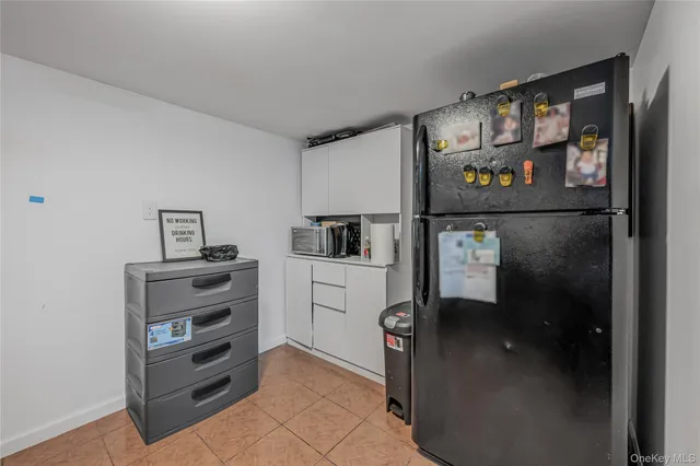 a kitchen with appliances and cabinets
