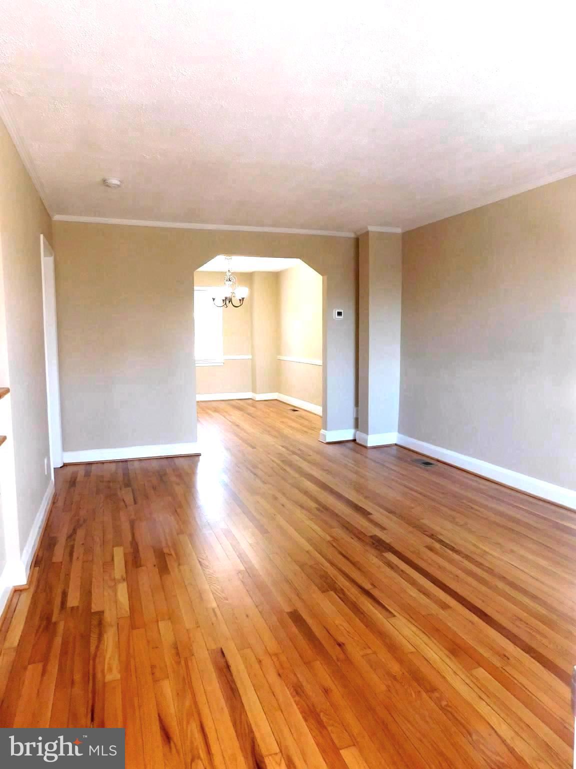 4012 Rexmere Road Baltimore, MD 21218 - Photo 3 of 29 a view of a room with wooden floor