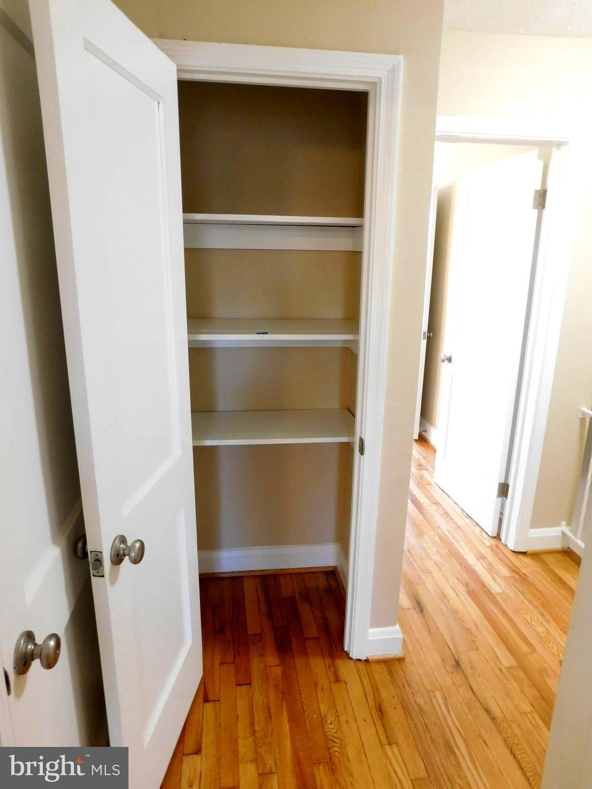 4012 Rexmere Road Baltimore, MD 21218 - Photo 23 of 29 a view of walk in closet with empty racks