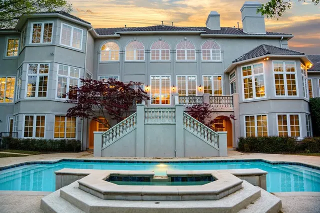 a front view of building with yard