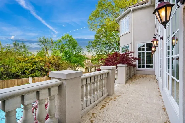 a view of street from balcony