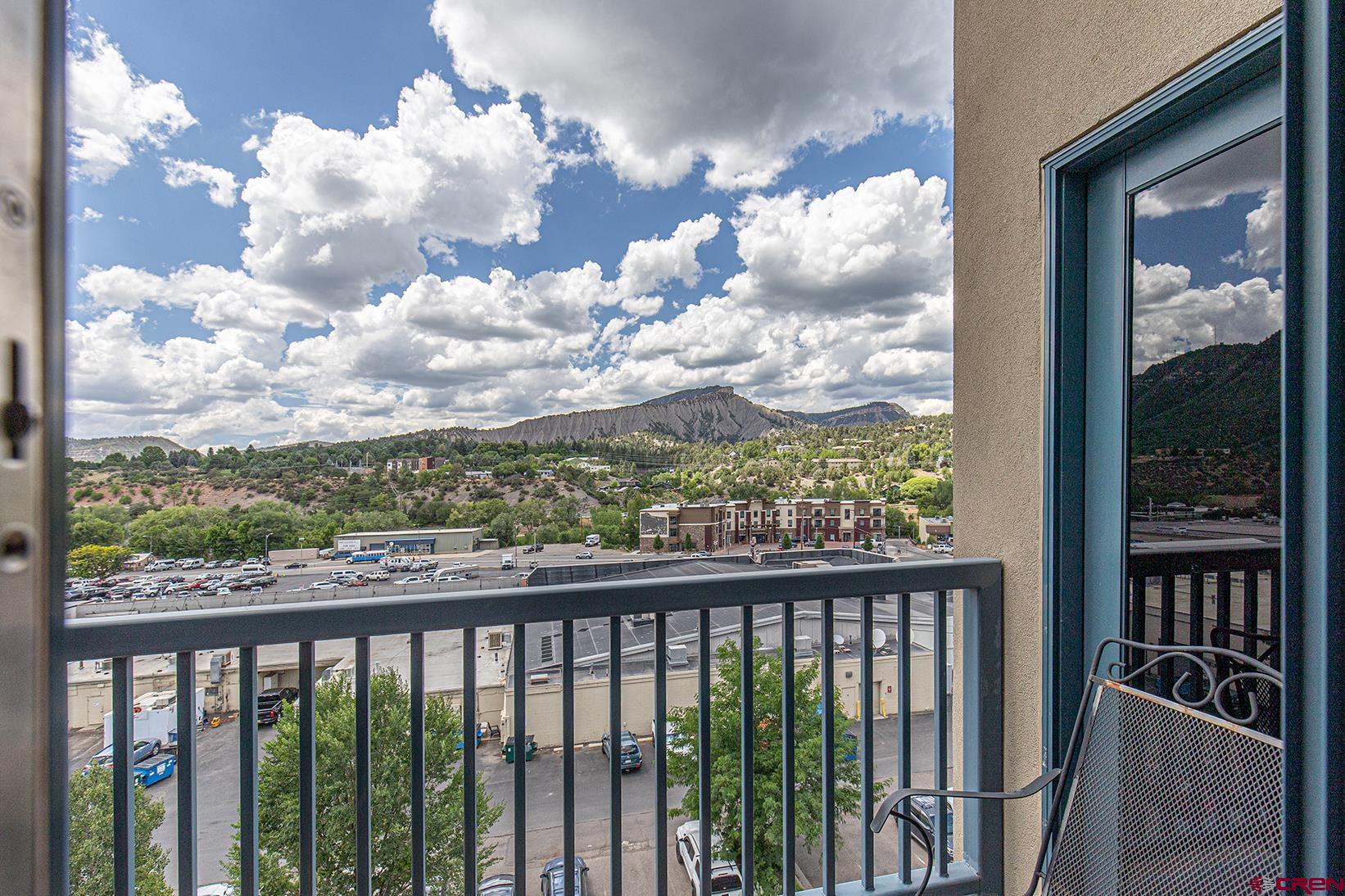 1099 Main Avenue, Unit 410 Durango, CO 81301 - Photo 21 of 34 a view of a balcony with wooden floor