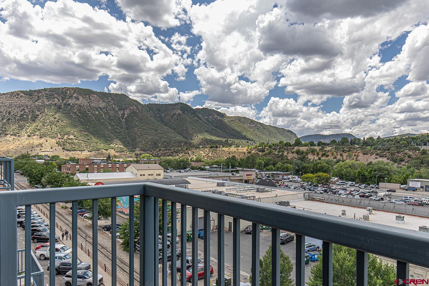 1099 Main Avenue, Unit 410 Durango, CO 81301 - Photo 22 of 34 a city view from a balcony