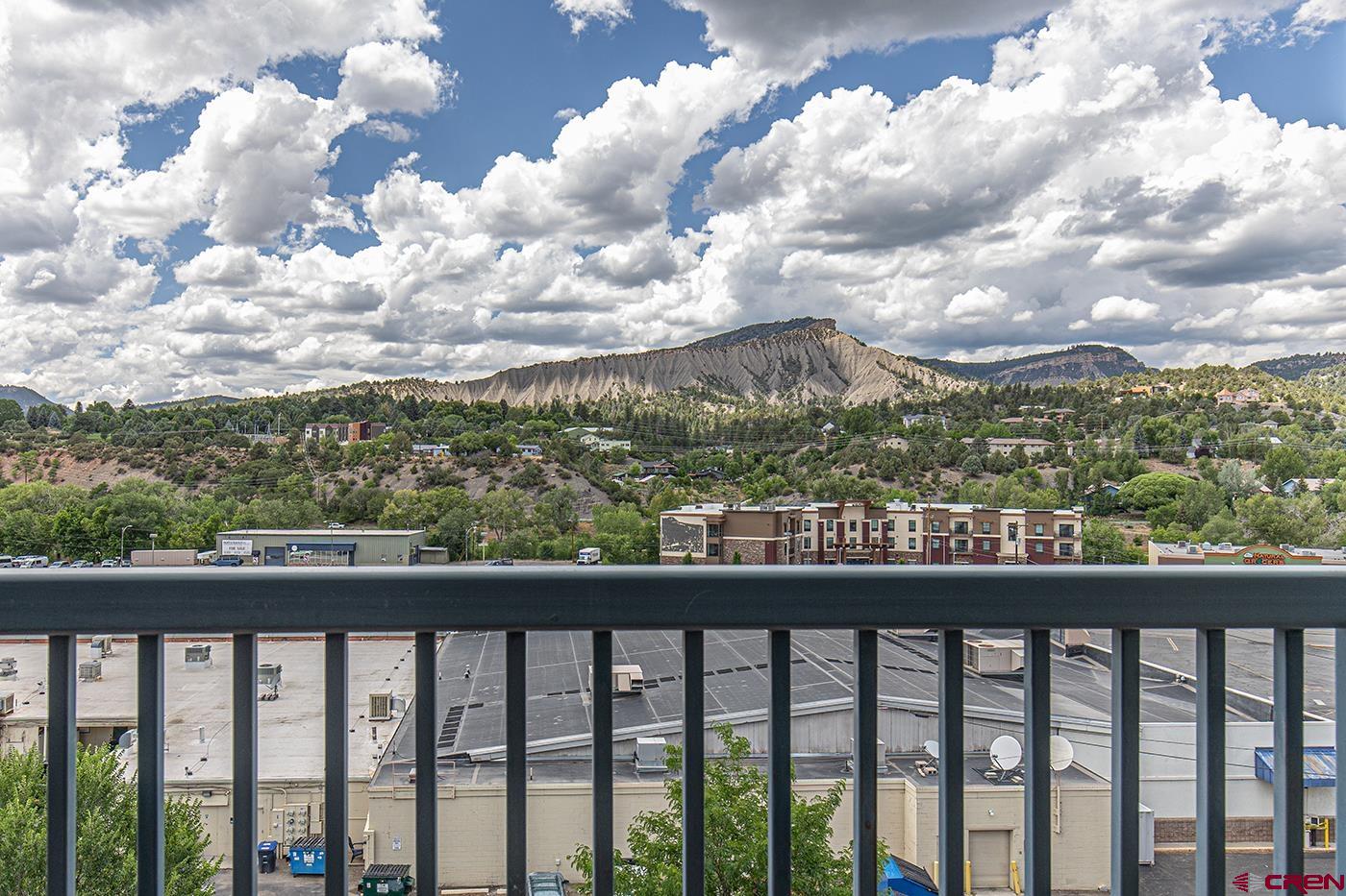 1099 Main Avenue, Unit 410 Durango, CO 81301 - Photo 23 of 34 a city view from a balcony