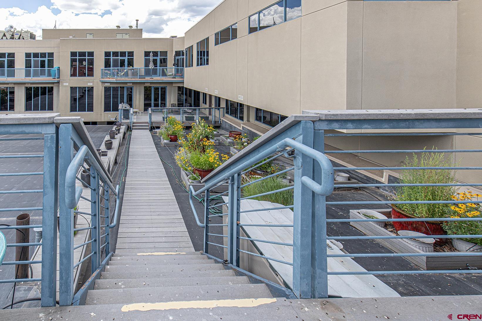 1099 Main Avenue, Unit 410 Durango, CO 81301 - Photo 27 of 34 a view of entryway and hall with wooden floor