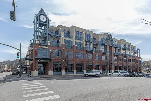 a front view of a building and a street