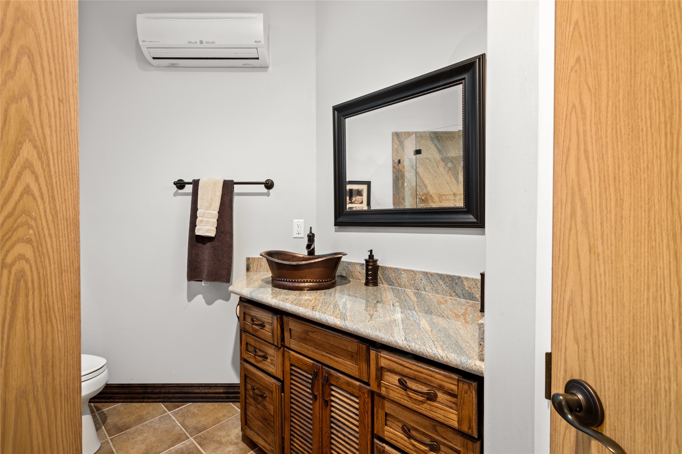 15126 Walden Road Montgomery, TX 77356 - Photo 44 of 50 One of the two full baths upstairs designed with exotic granite and custom cabinetry.