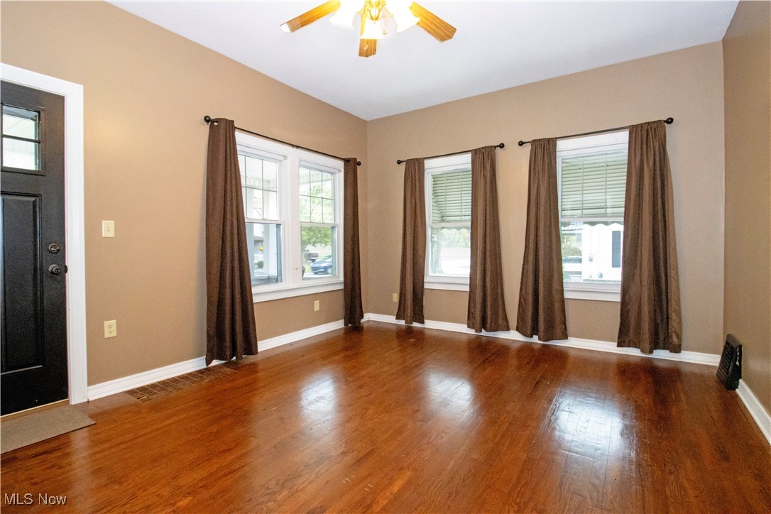 5699 Massillon Road Dalton, OH 44618 - Photo 14 of 24 Entryway with ceiling fan and dark hardwood / wood-style floors
