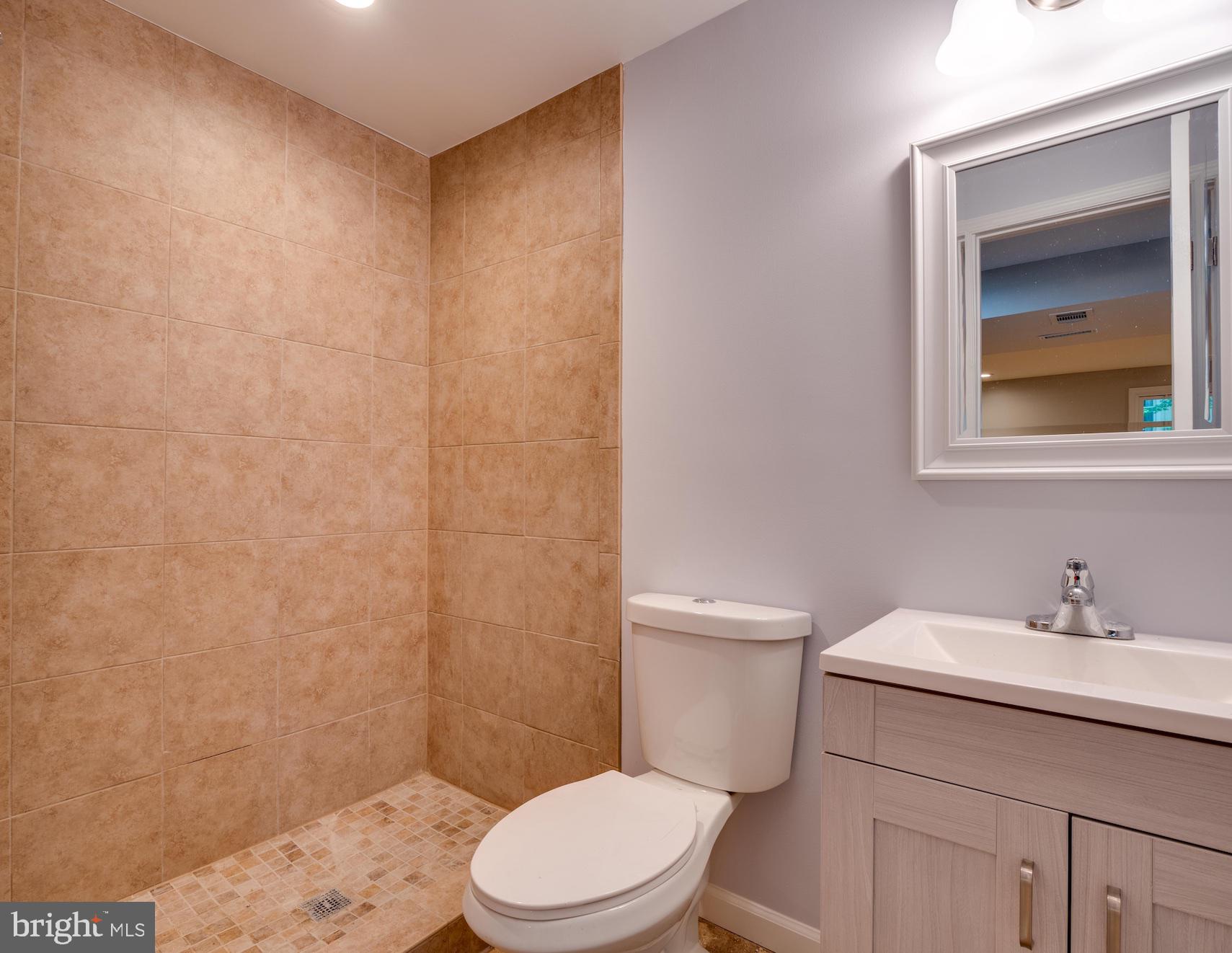 12276 Turkey Wing Court Reston, VA 20191 - Photo 29 of 39 Travertine flooring, granite countertop