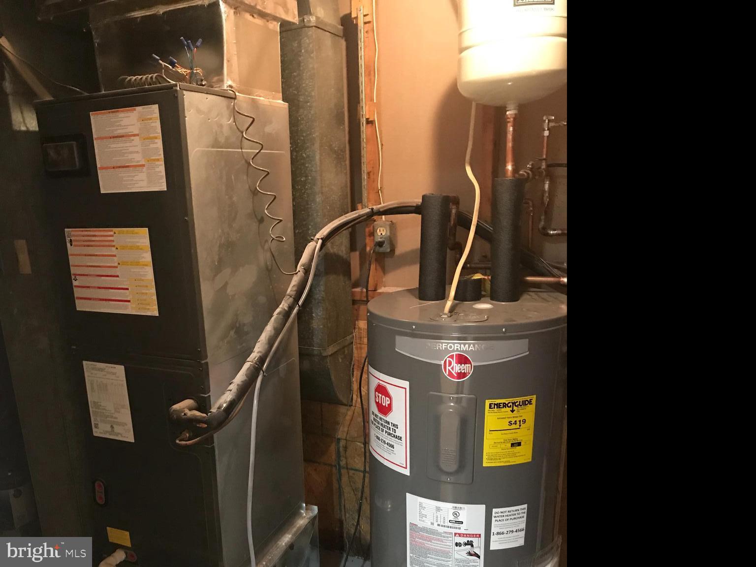 12276 Turkey Wing Court Reston, VA 20191 - Photo 36 of 39 New heat pump, AC. and hot water heater
