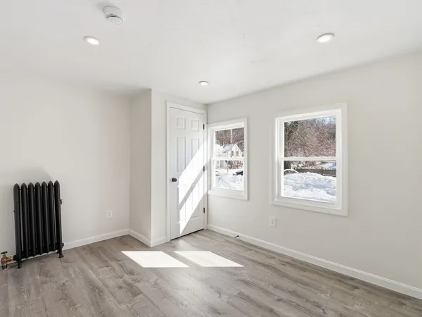 an empty room with windows