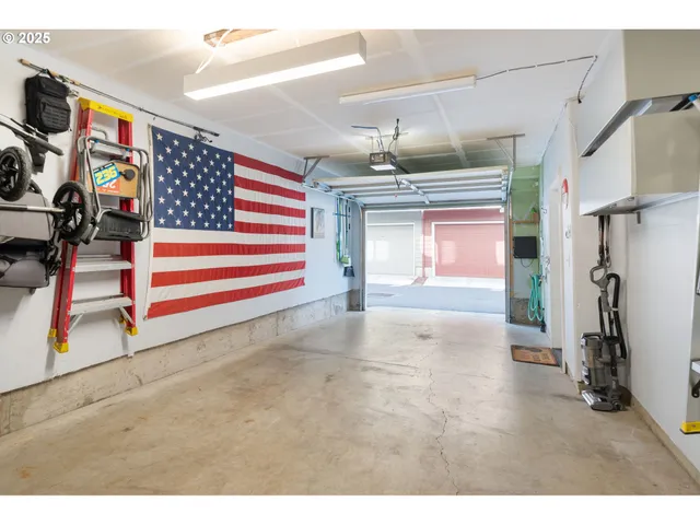 a view of a street with tall buildings